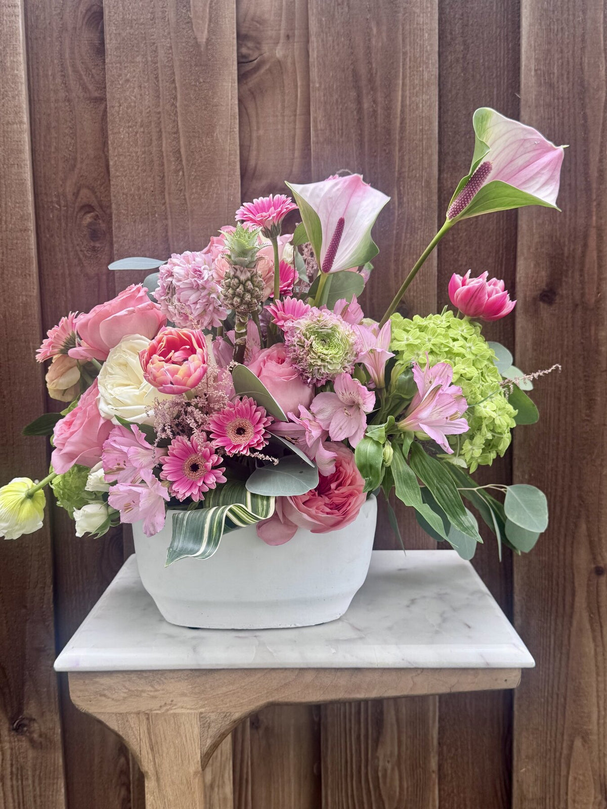 Lush pink and white floral arrangement